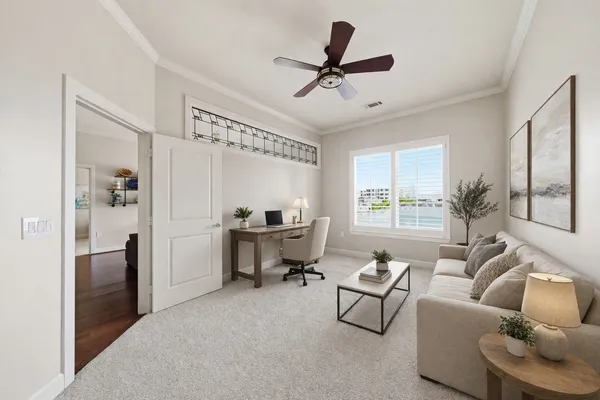 a living room with furniture and a window