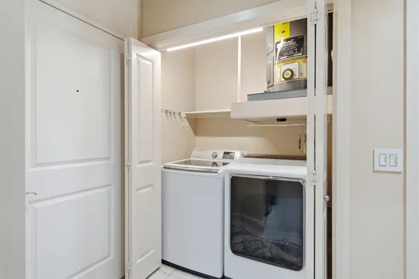a view of washer and dryer with a utility room