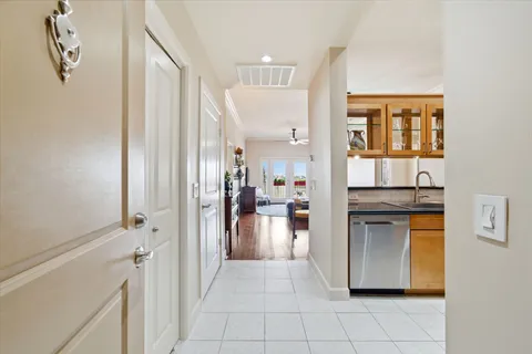 a view of a kitchen from the hallway