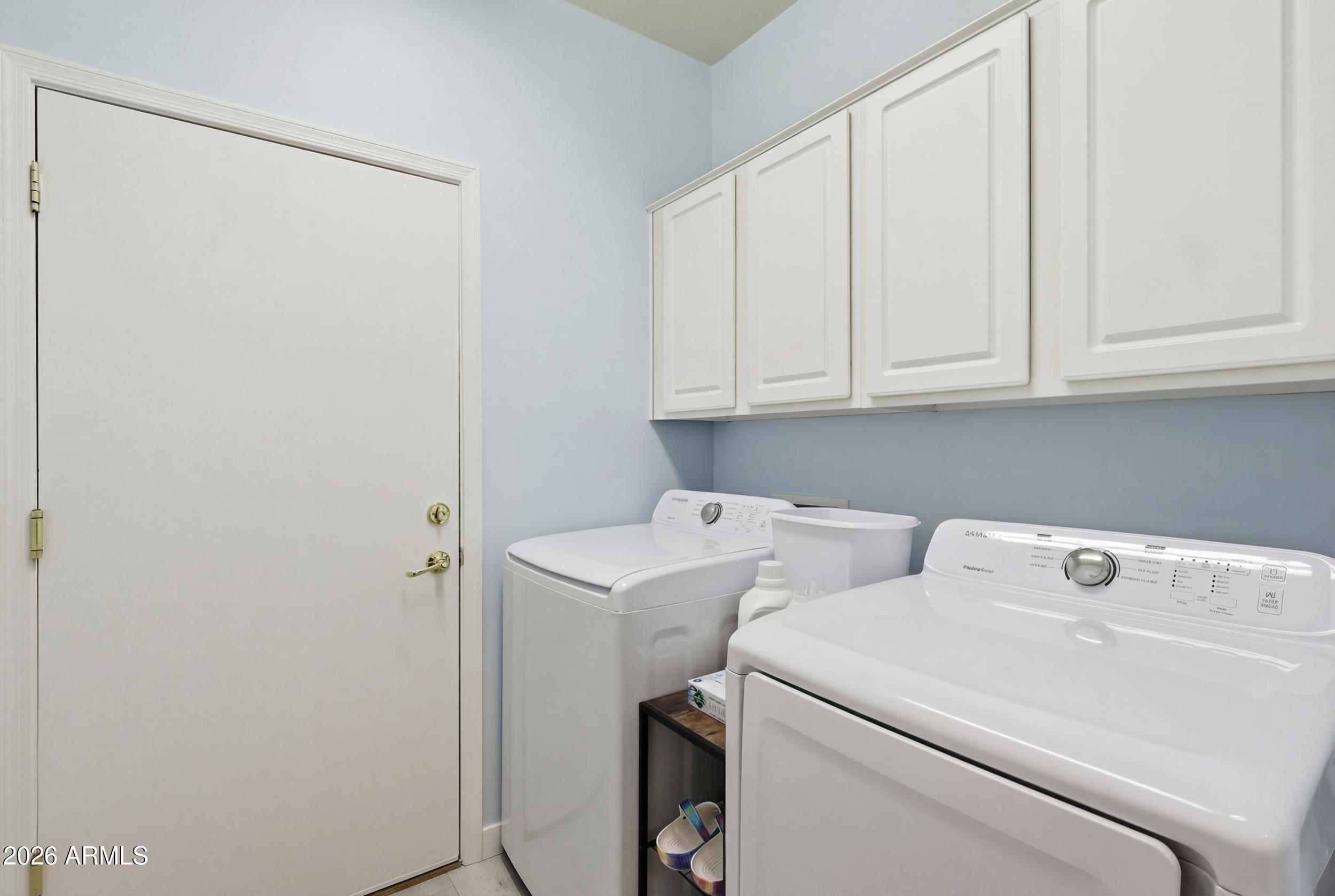 20357 North Lemon Drop Drive Maricopa, AZ 85138 - Photo 18 of 39 a utility room with dryer and washer