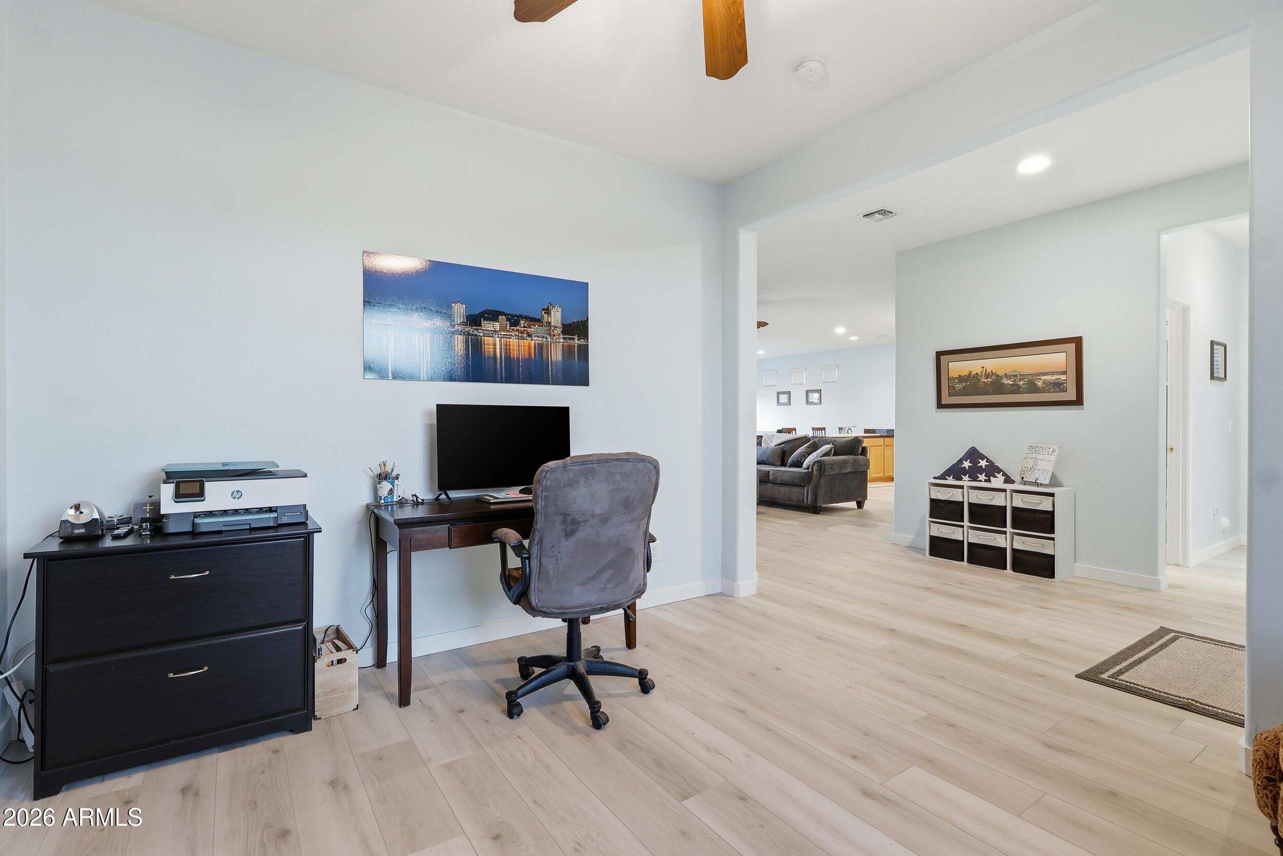 20357 North Lemon Drop Drive Maricopa, AZ 85138 - Photo 22 of 39 a workspace with furniture