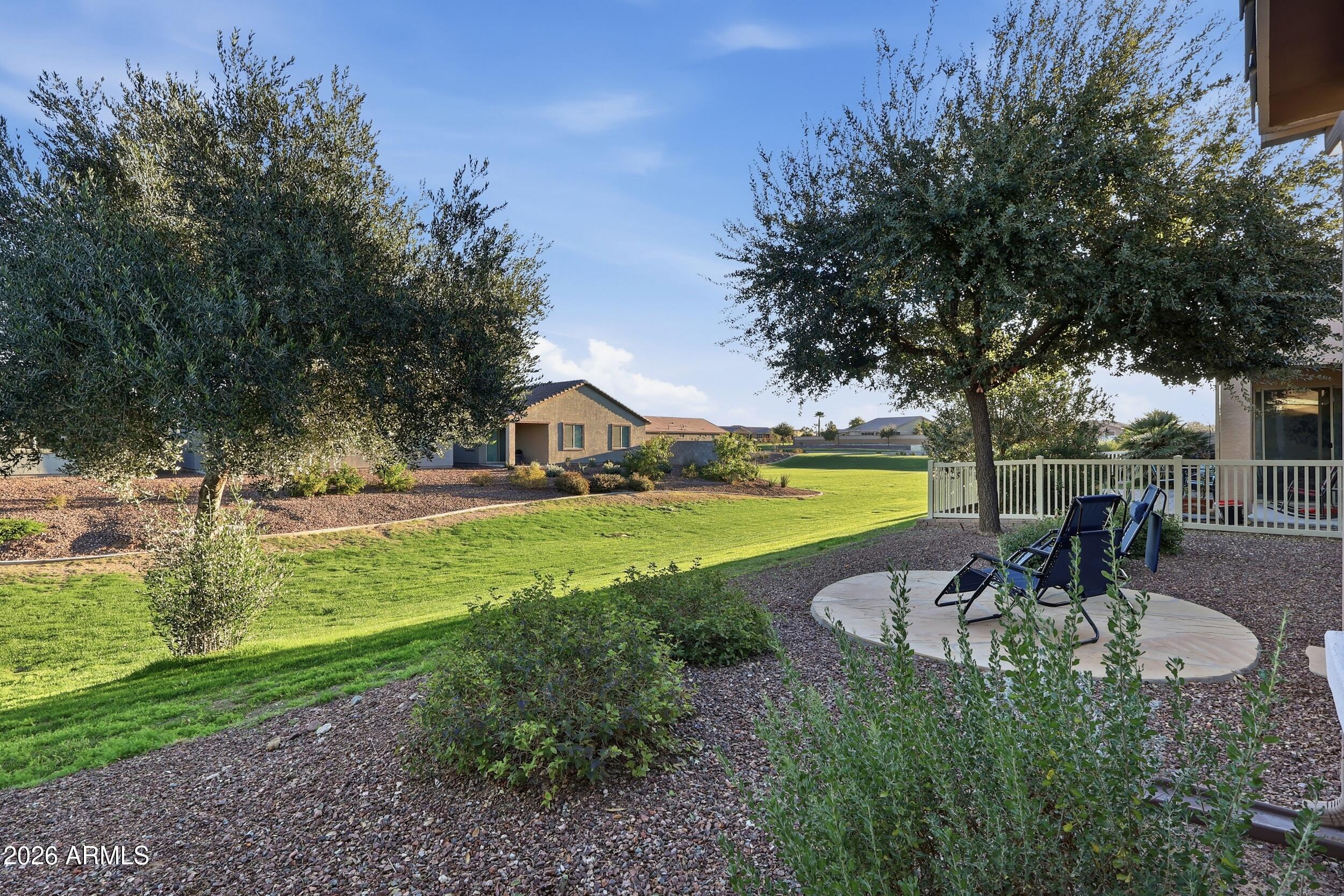 20357 North Lemon Drop Drive Maricopa, AZ 85138 - Photo 3 of 39 a view of a house with a yard