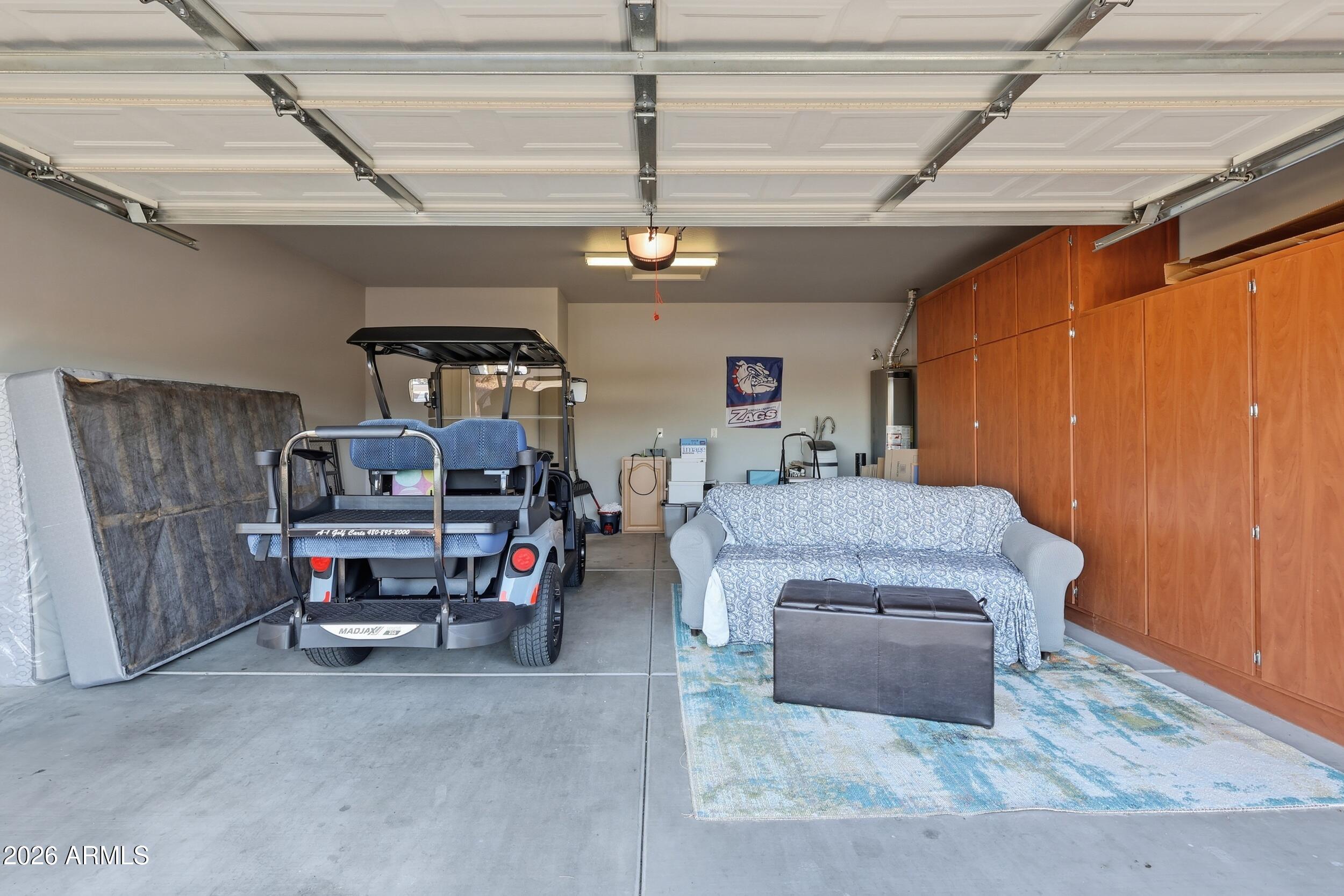 20357 North Lemon Drop Drive Maricopa, AZ 85138 - Photo 33 of 39 a living room with furniture and a dining table