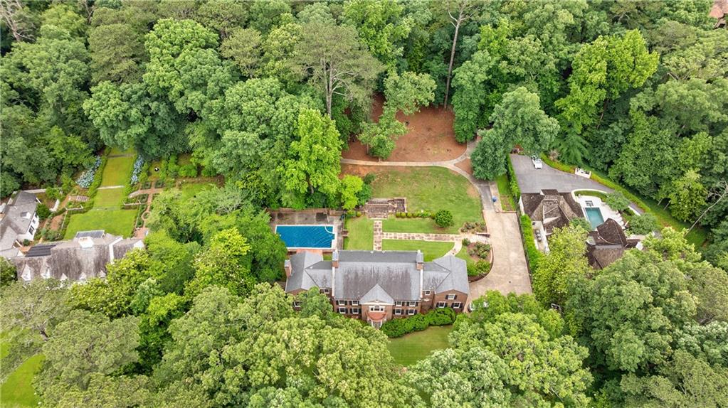 280 Blackland Road Northwest Atlanta, GA 30342 - Photo 3 of 17 an aerial view of a house with outdoor space and street view