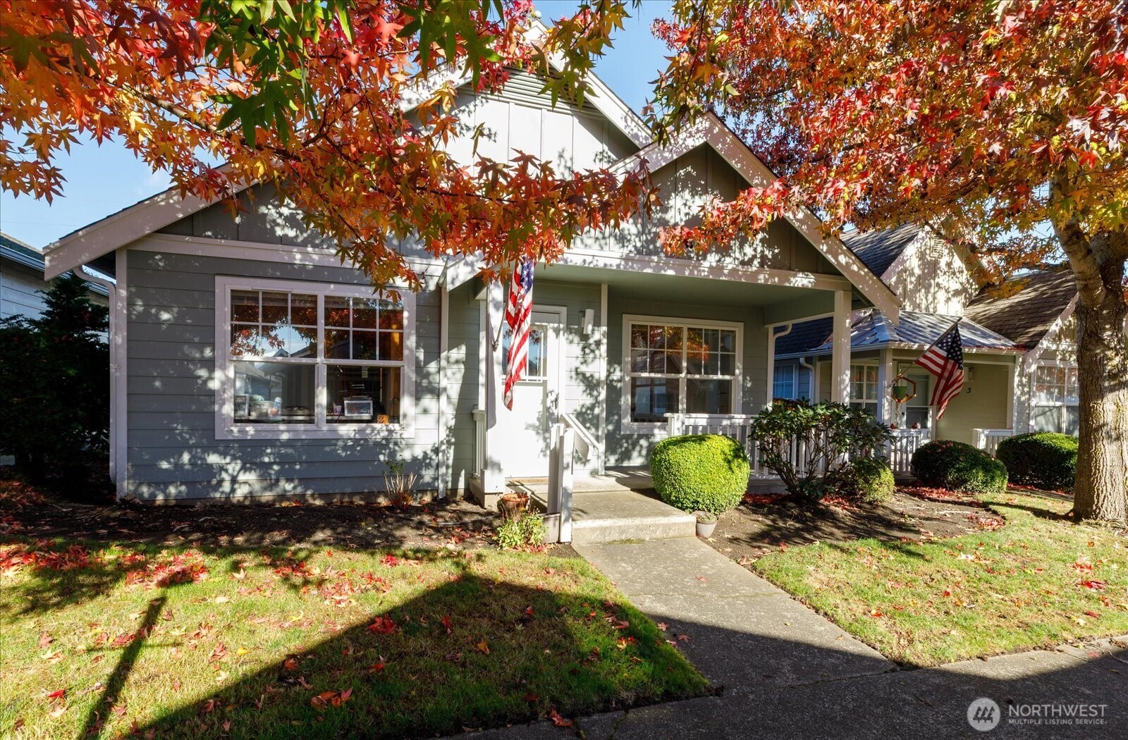 161 West Whidbey Avenue, Unit 5 Oak Harbor, WA 98277 - Photo 1 of 32 a front view of a house with patio