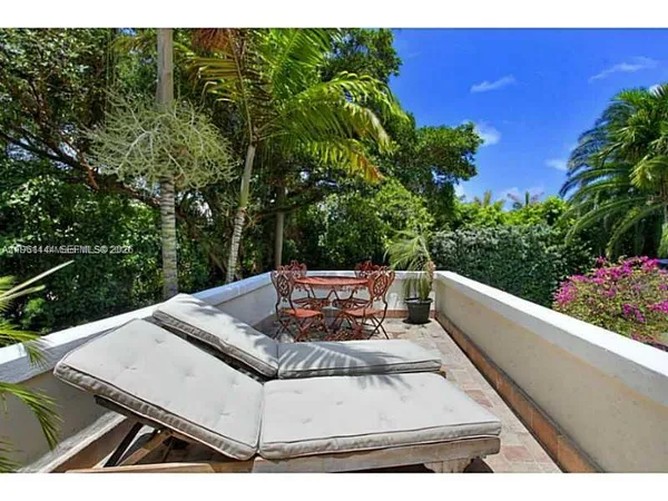 a view of a couches in a balcony