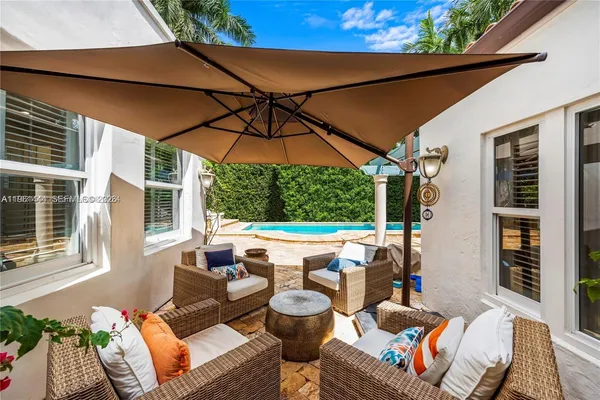 a outdoor space with patio the couches and a potted plant