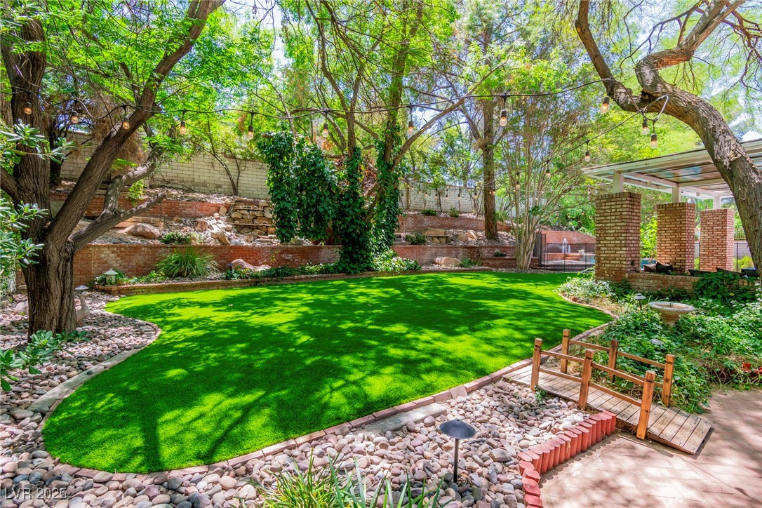 108 Quail Run Road Henderson, NV 89014 - Photo 46 of 50 Fenced backyard featuring a deck