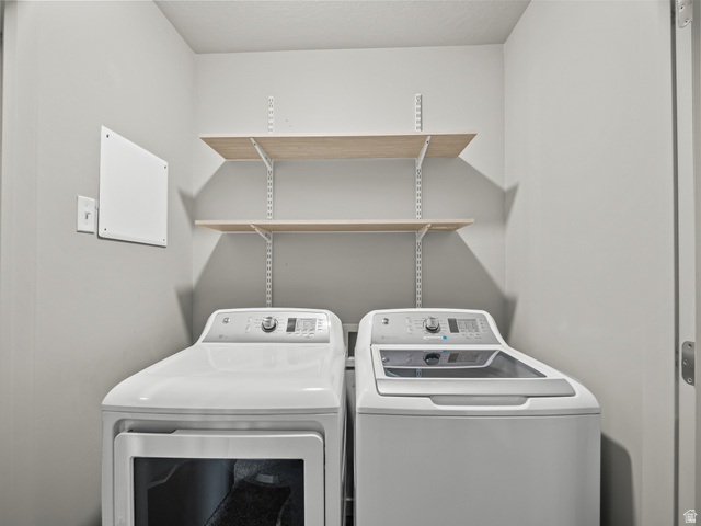 64 West 600 South, Unit C301 Springville, UT 84663 - Photo 22 of 40 Laundry room featuring washing machine and dryer