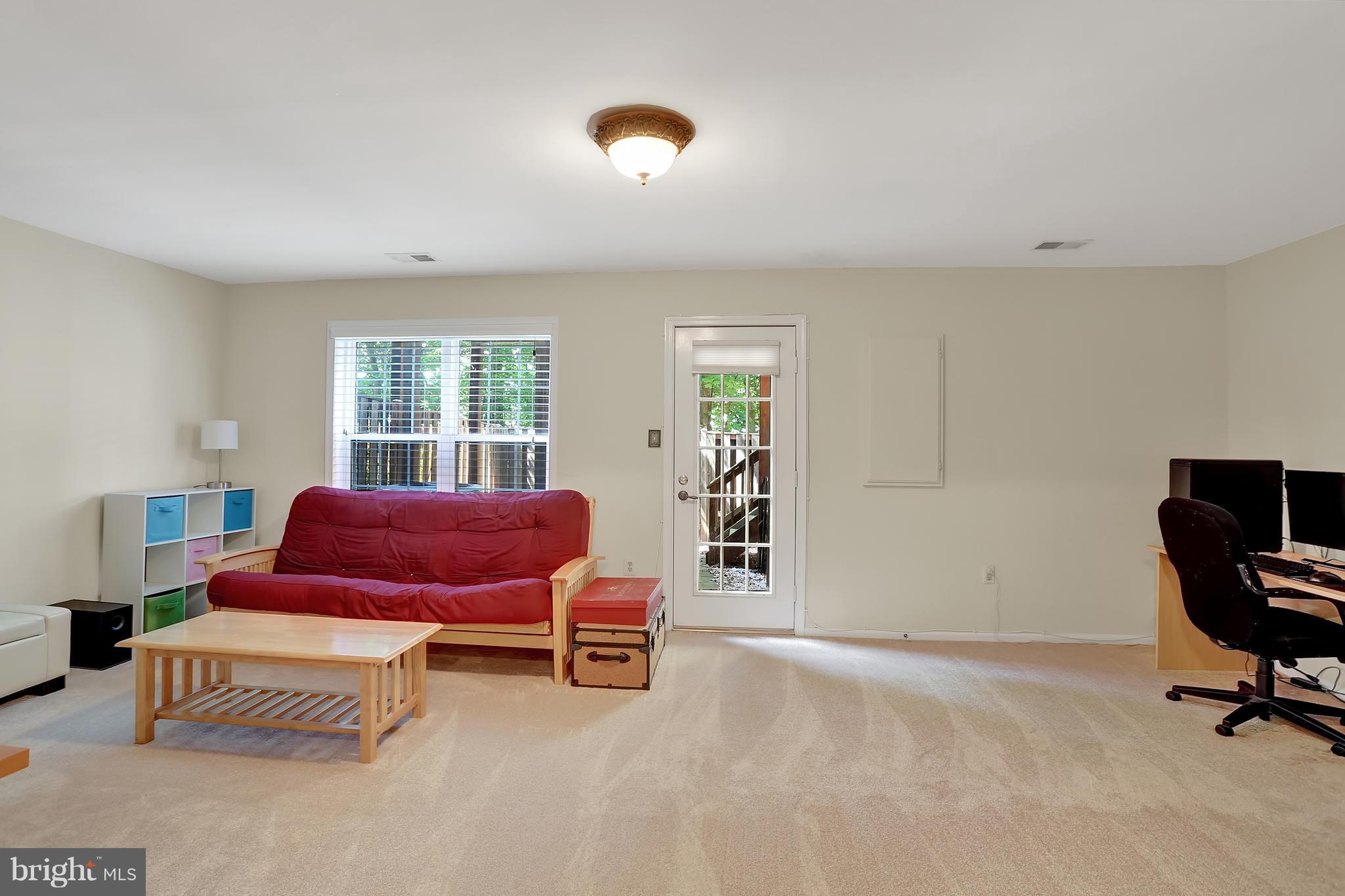 20693 Riptide Square Sterling, VA 20165 - Photo 27 of 30 a bedroom with furniture and a window