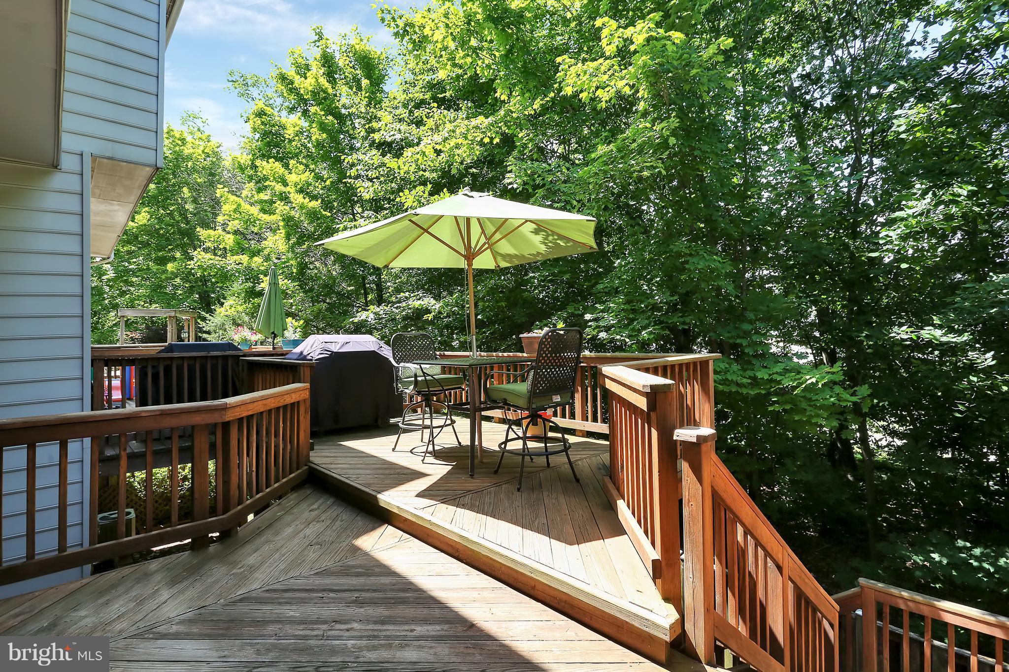 20693 Riptide Square Sterling, VA 20165 - Photo 30 of 30 a view of balcony with outdoor seating and wooden floor