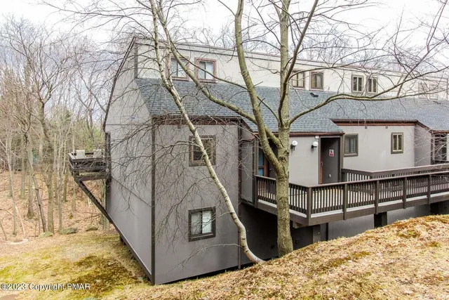 a view of a house with a snow on the wall