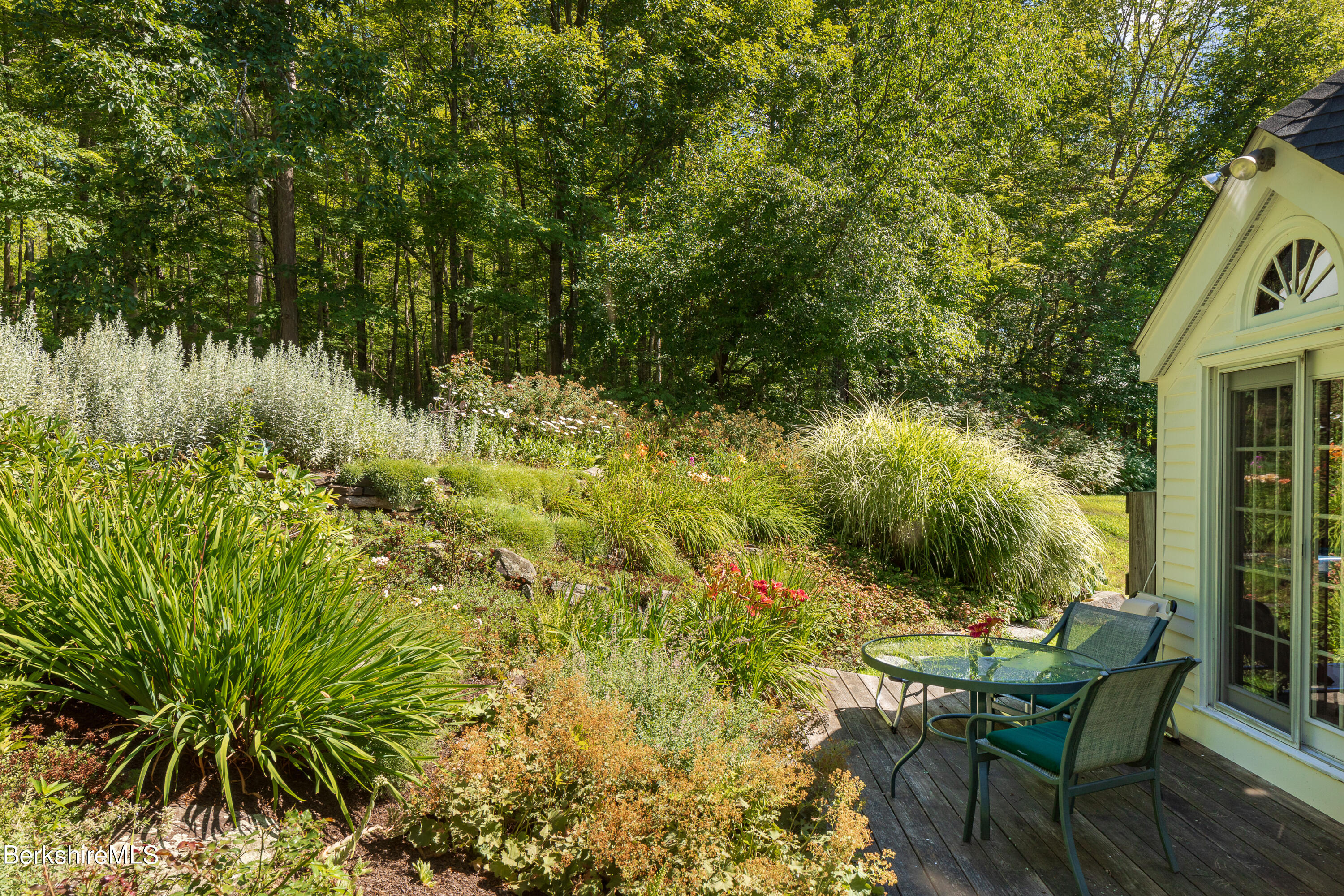 73 Scoville Road Cornwall, CT 06796 - Photo 23 of 26 a view of backyard with seating area and green space