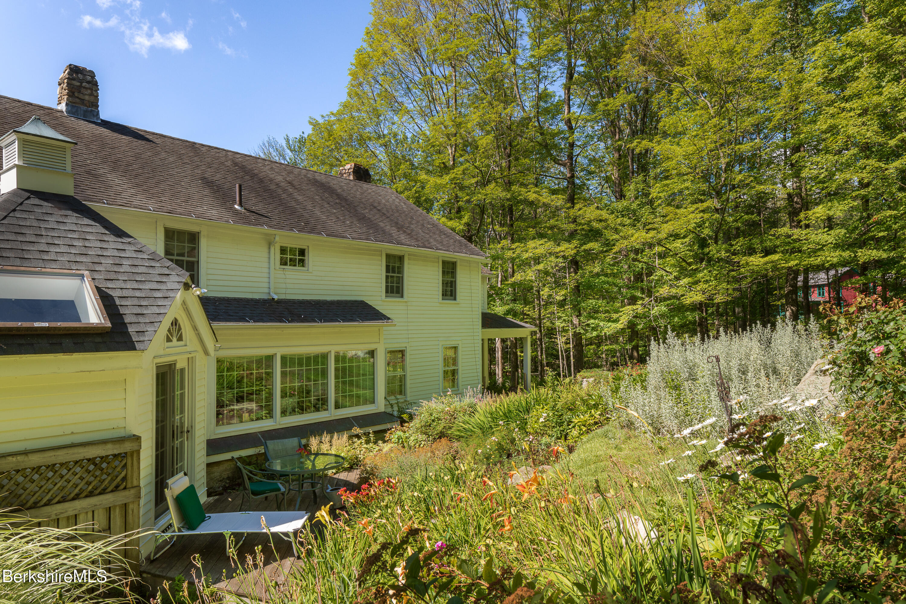 73 Scoville Road Cornwall, CT 06796 - Photo 24 of 26 a front view of a house with a yard