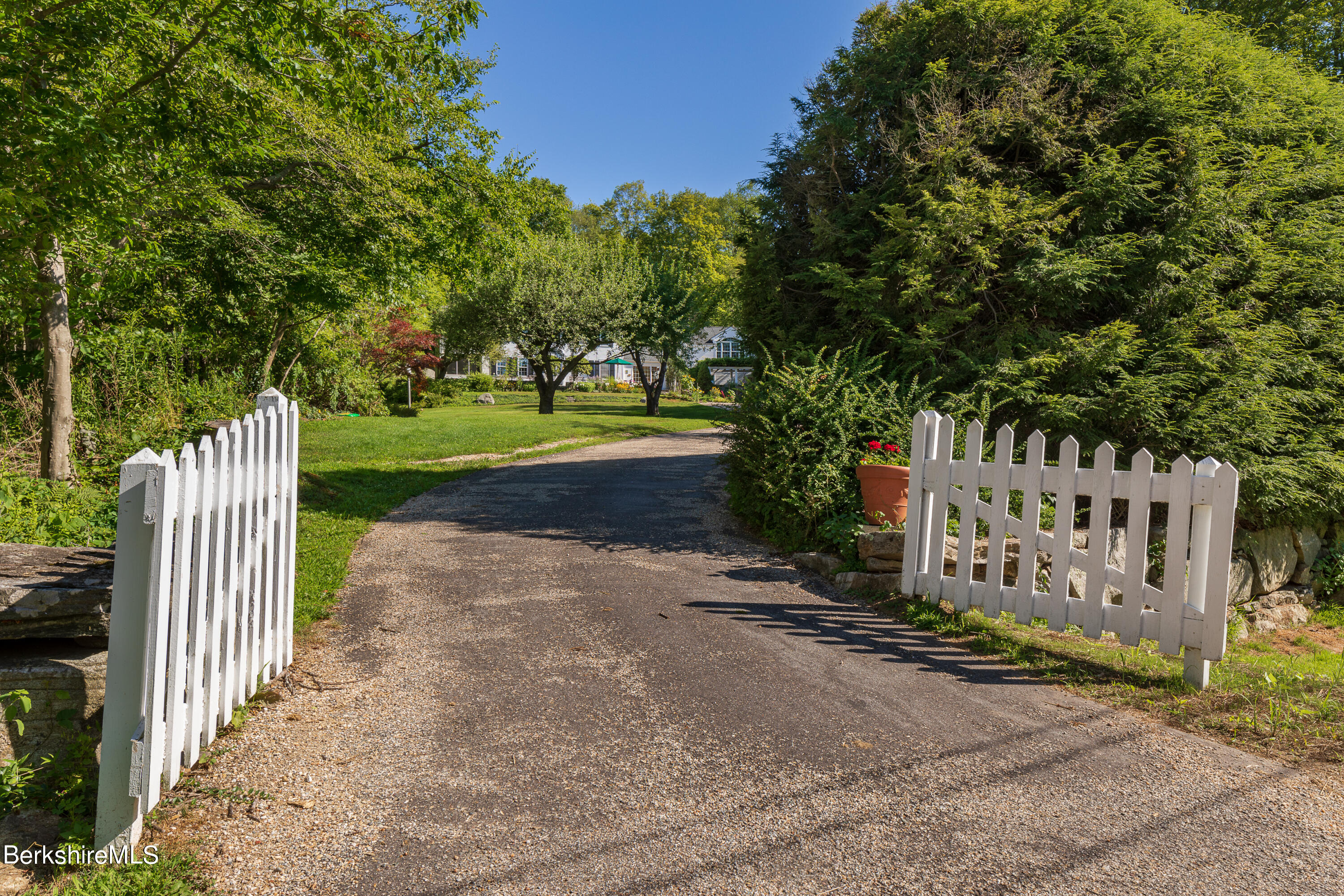 73 Scoville Road Cornwall, CT 06796 - Photo 25 of 26 a view of a street with wooden fence