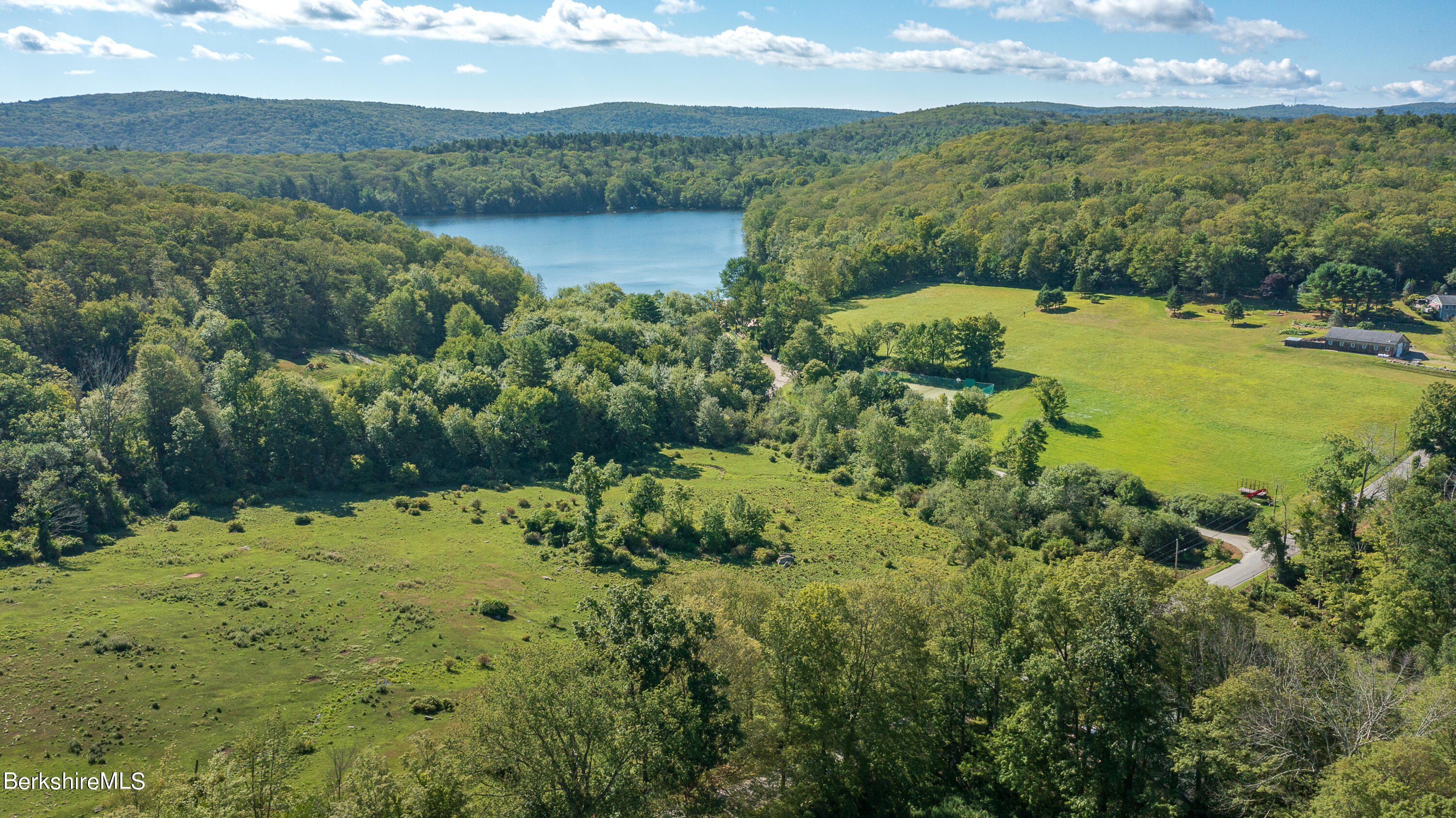 73 Scoville Road Cornwall, CT 06796 - Photo 3 of 26 a view of a lake with a mountain