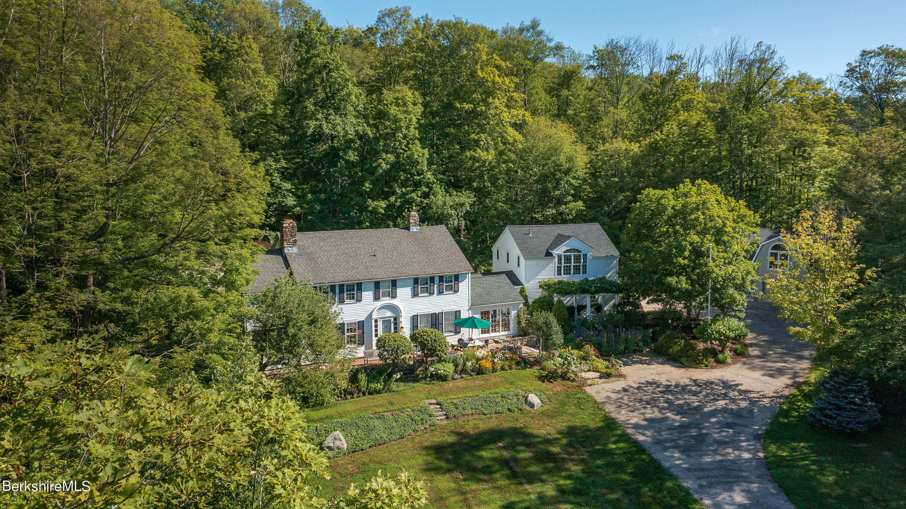 73 Scoville Road Cornwall, CT 06796 - Photo 5 of 26 a view of a house with a yard and sitting area