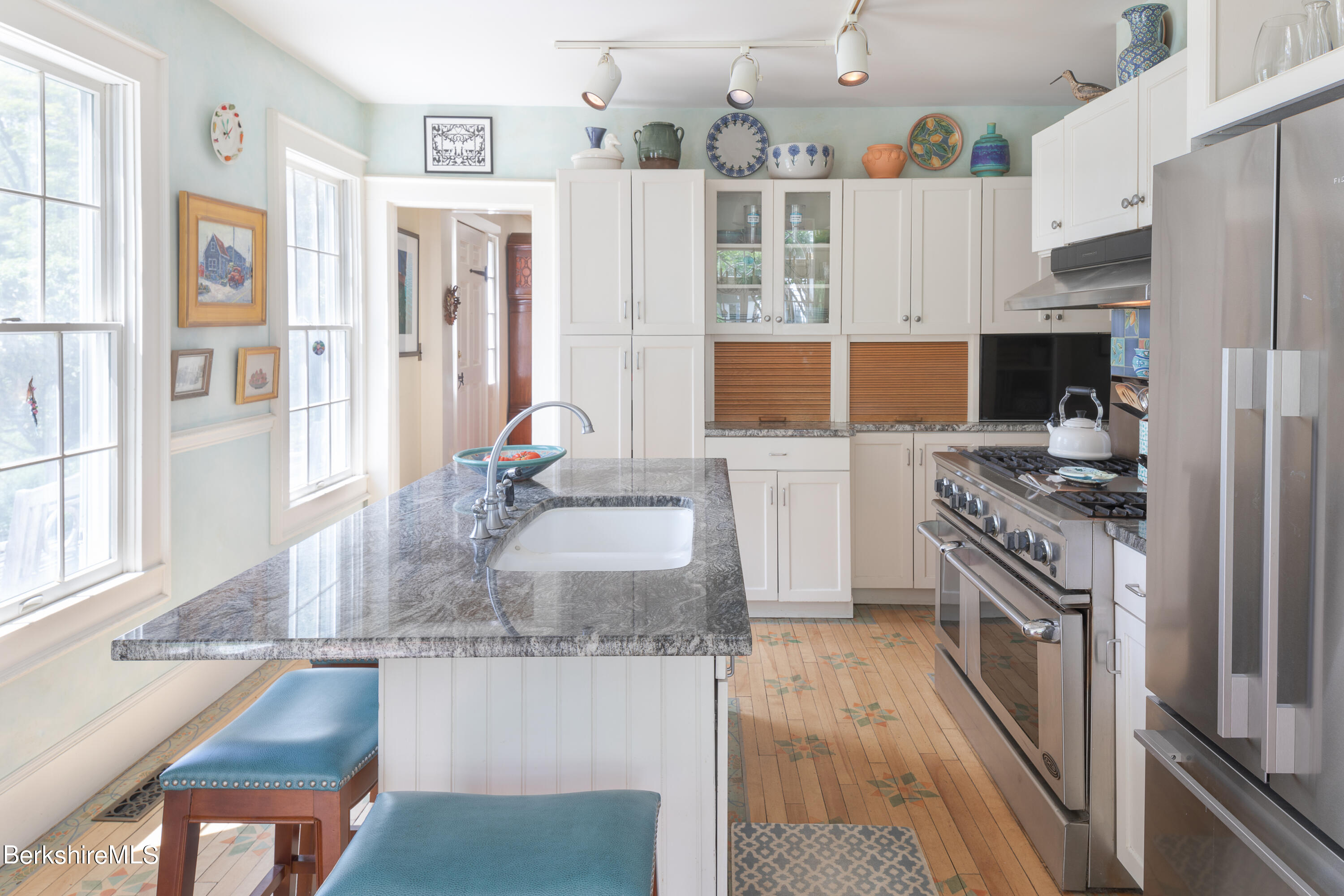 73 Scoville Road Cornwall, CT 06796 - Photo 10 of 26 a kitchen with stainless steel appliances granite countertop a stove and a refrigerator