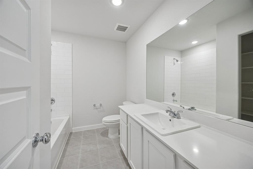 316 Millwood Road Lavon, TX 75166 - Photo 30 of 37 Bathroom in the Oak II home plan by Trophy Signature Homes – REPRESENTATIVE PHOTO