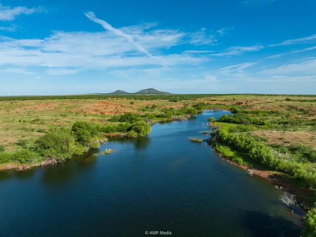 a view of an ocean from a city