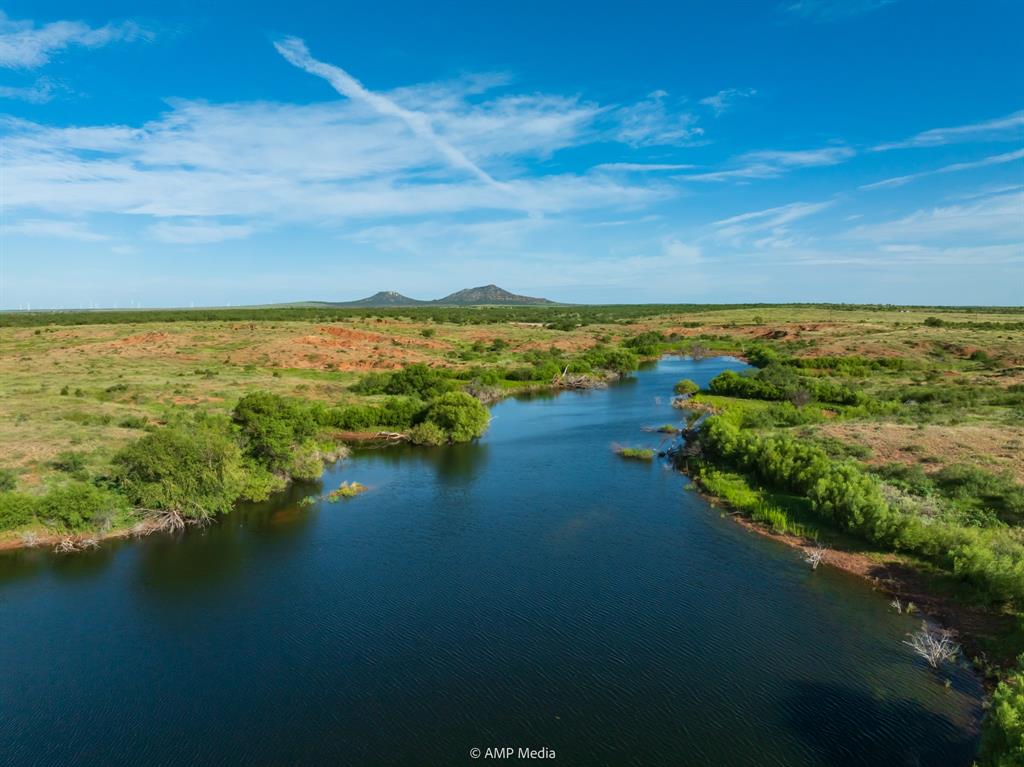 a view of an ocean from a city