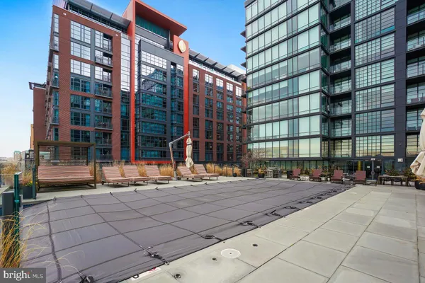 a building outdoor space with a car parked