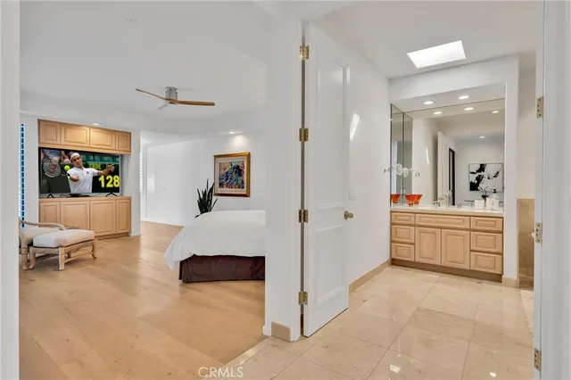 a view of a livingroom with furniture and a window