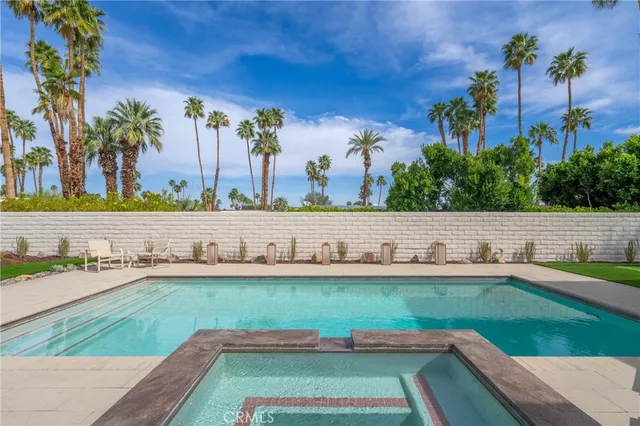 a view of an outdoor space and swimming pool