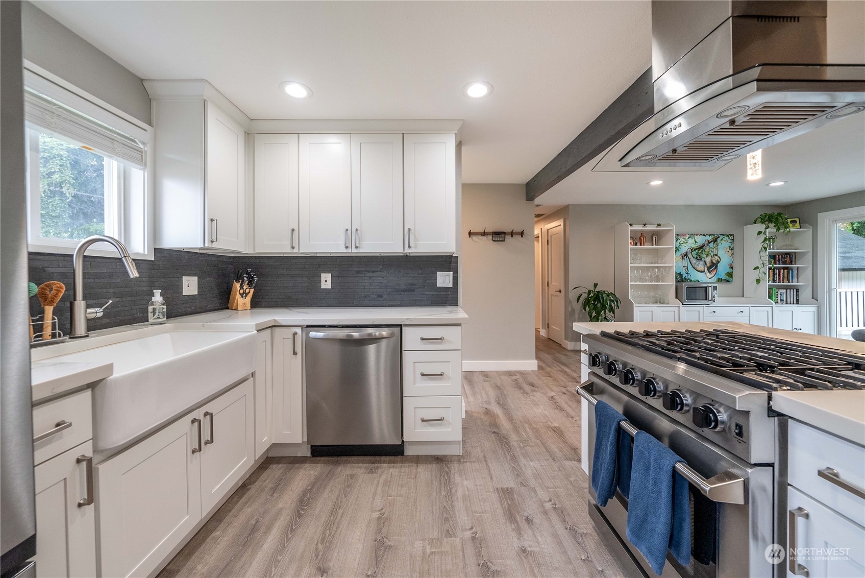 17920 91st Place Northeast Bothell, WA 98011 - Photo 14 of 39 a kitchen with stainless steel appliances granite countertop a stove a sink dishwasher and a refrigerator