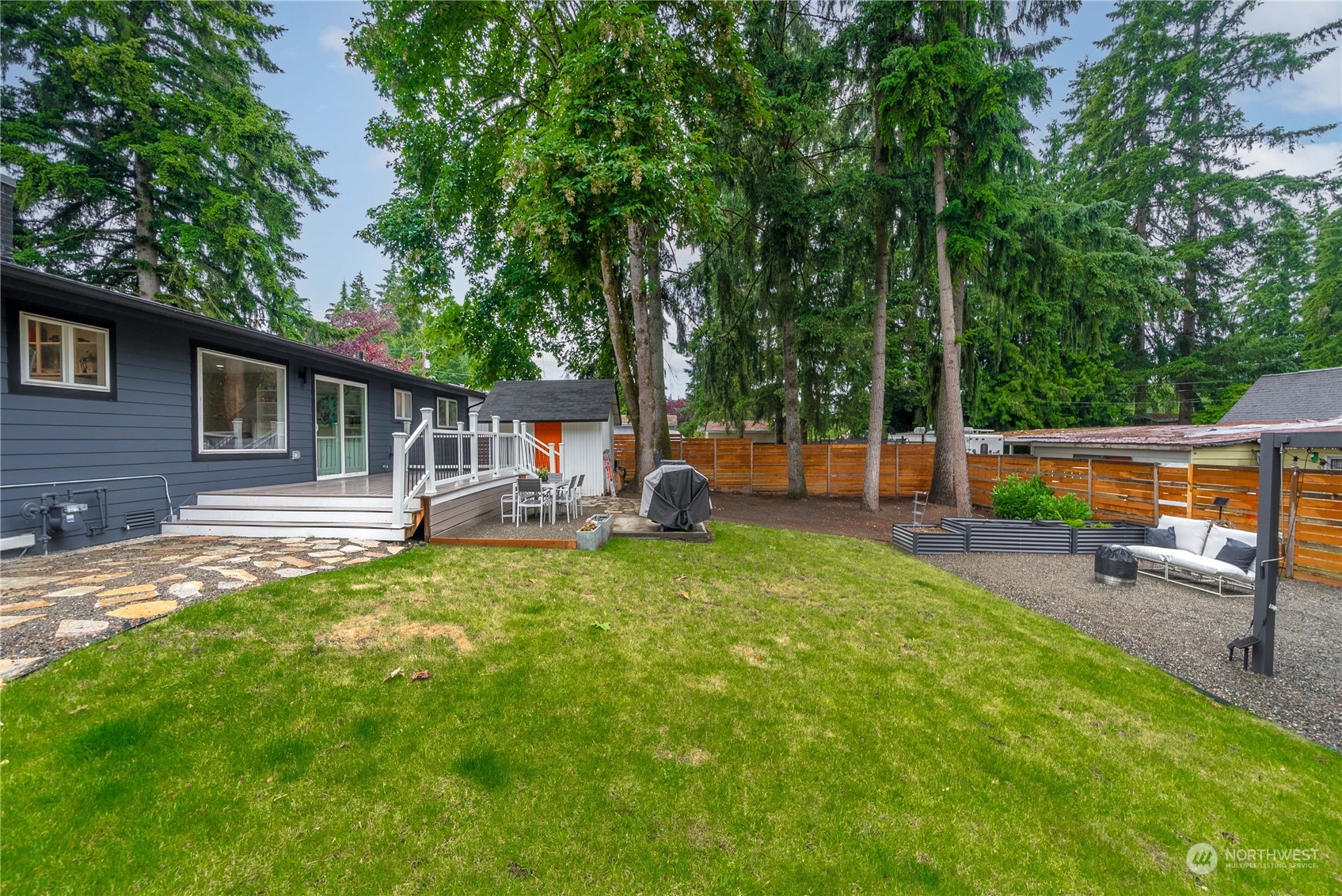 17920 91st Place Northeast Bothell, WA 98011 - Photo 35 of 39 a view of a house with backyard and a slide