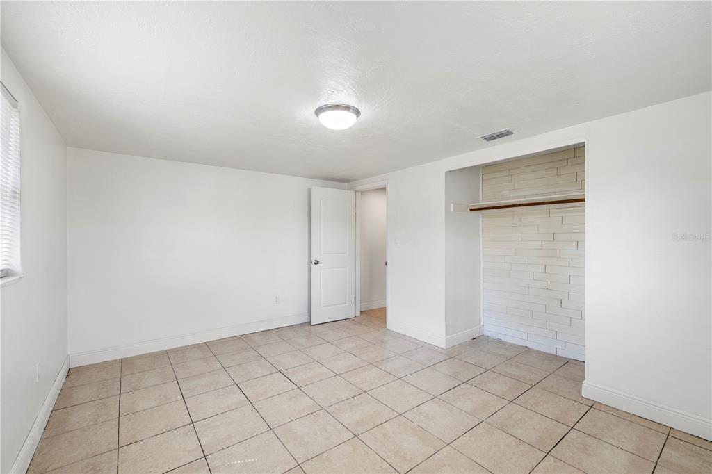10803 Hyssop Street Port Richey, FL 34668 - Photo 26 of 42 a view of an empty room