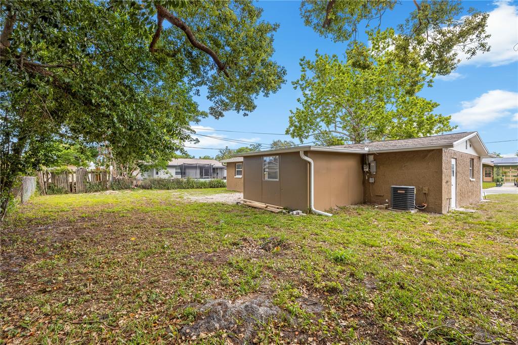 10803 Hyssop Street Port Richey, FL 34668 - Photo 29 of 42 a view of outdoor space and yard
