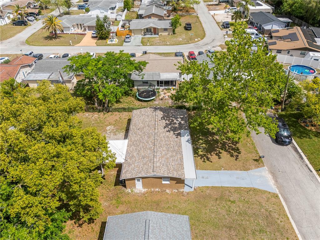 10803 Hyssop Street Port Richey, FL 34668 - Photo 32 of 42 an aerial view of residential houses with outdoor space