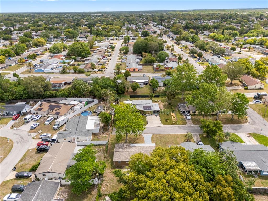 10803 Hyssop Street Port Richey, FL 34668 - Photo 39 of 42 an aerial view of residential houses with outdoor space