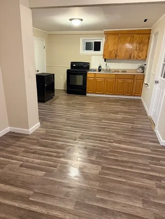 a living room with furniture and flat screen tv