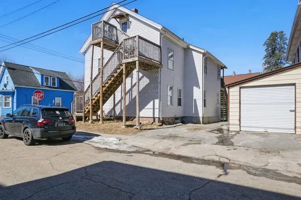 a car parked in front of a house