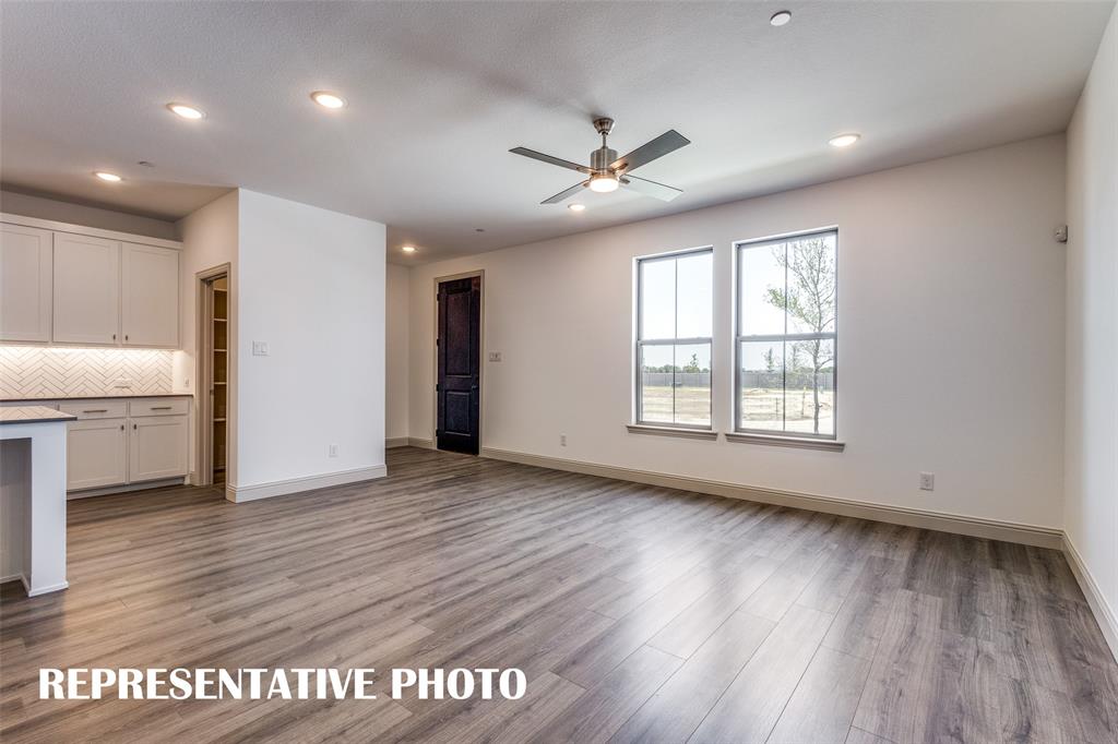 2852 Chisos Red Road McKinney, TX 75071 - Photo 2 of 15 Welcome into your beautiful new, light filled lock and leave lifestyle home! REPRESENTATIVE PHOTO
