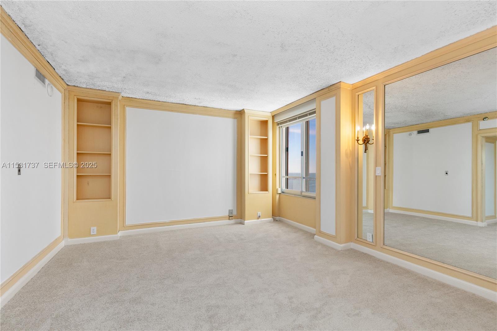 1541 Brickell Avenue, Unit C1507 Miami, FL 33129 - Photo 23 of 69 a view of an empty room with closet and entryway