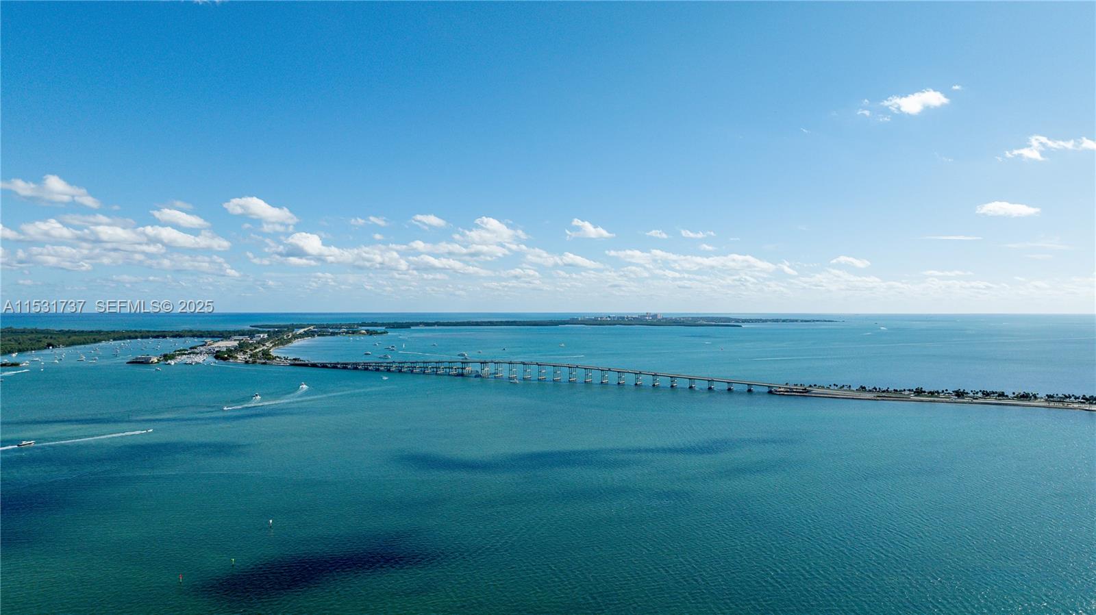 1541 Brickell Avenue, Unit C1507 Miami, FL 33129 - Photo 67 of 69 a view of a golf course with a lake