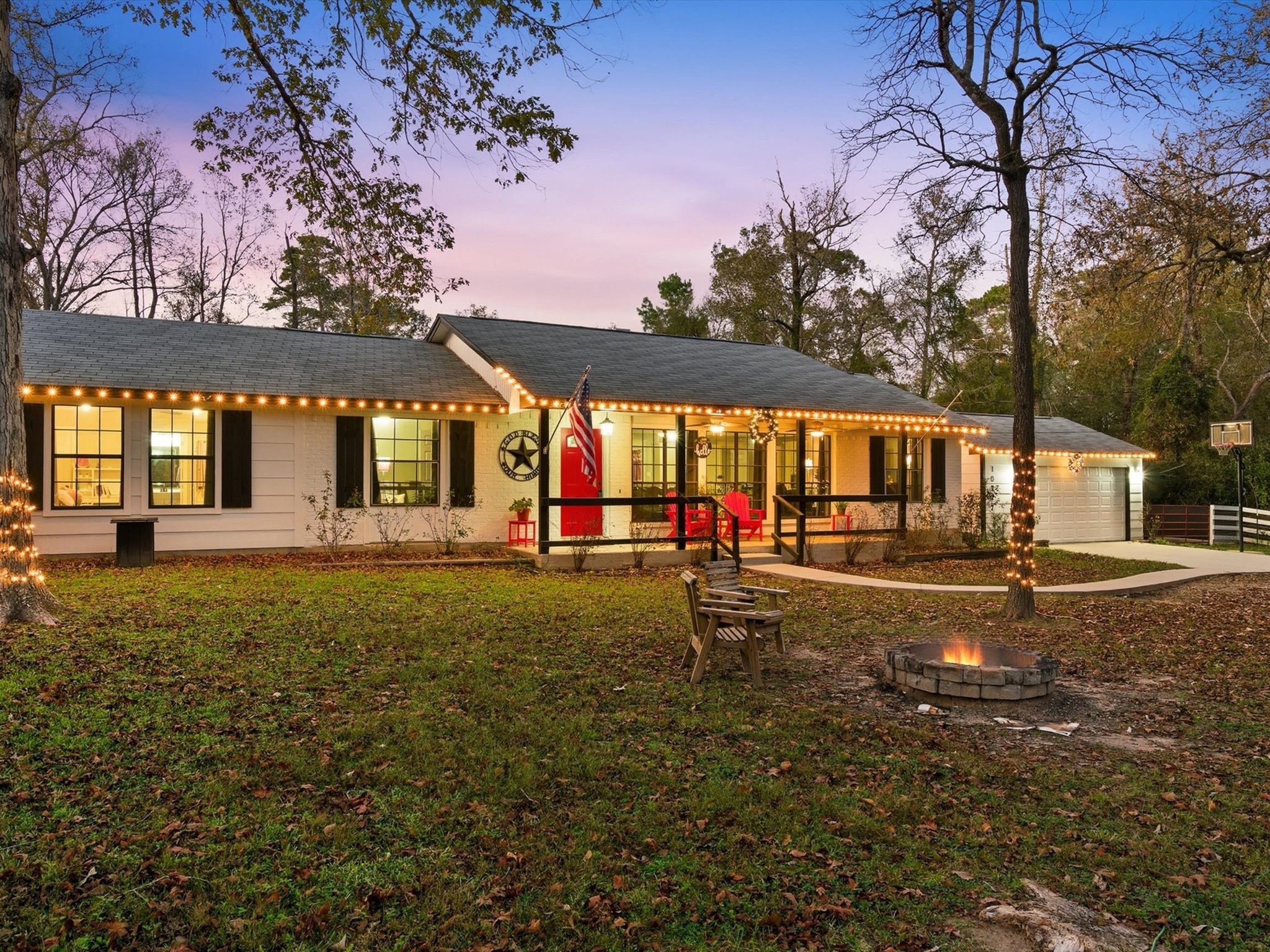 10277 Champion Forest Loop Conroe, TX 77303 - Photo 1 of 45 a view of a house with backyard and sitting area
