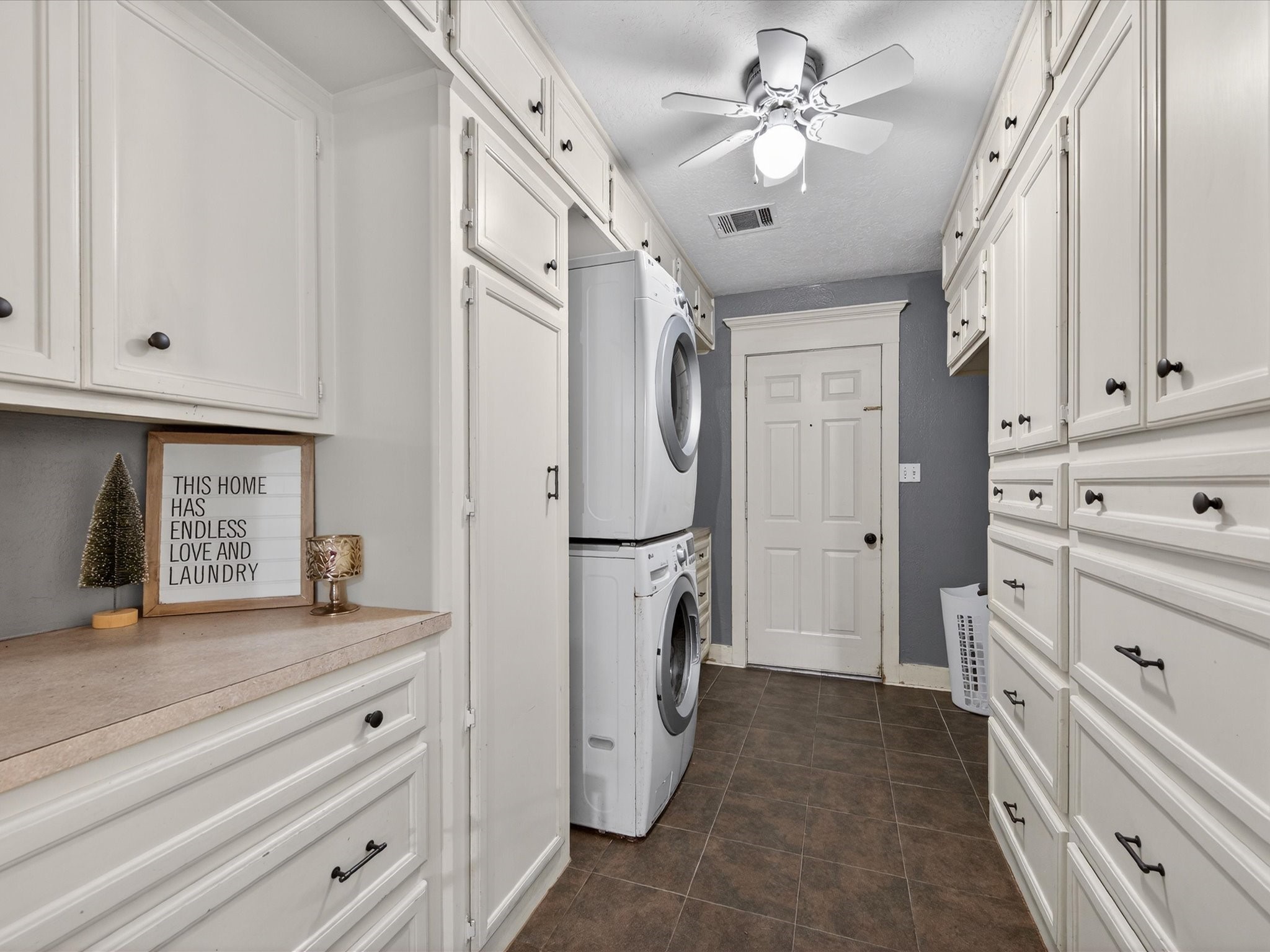 10277 Champion Forest Loop Conroe, TX 77303 - Photo 34 of 45 a view of hallway with washer and dryer