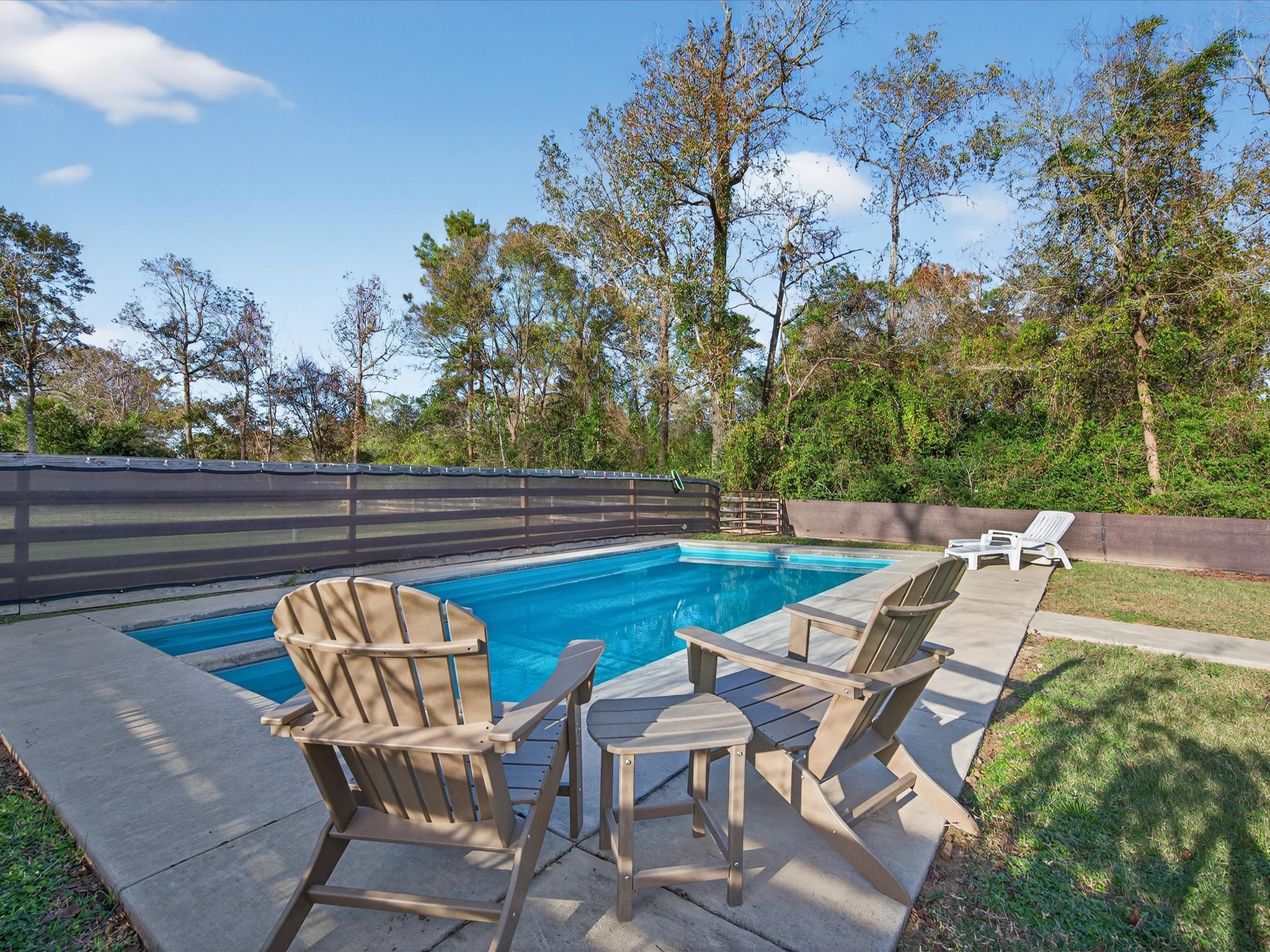 10277 Champion Forest Loop Conroe, TX 77303 - Photo 36 of 45 a view of yard with seating area