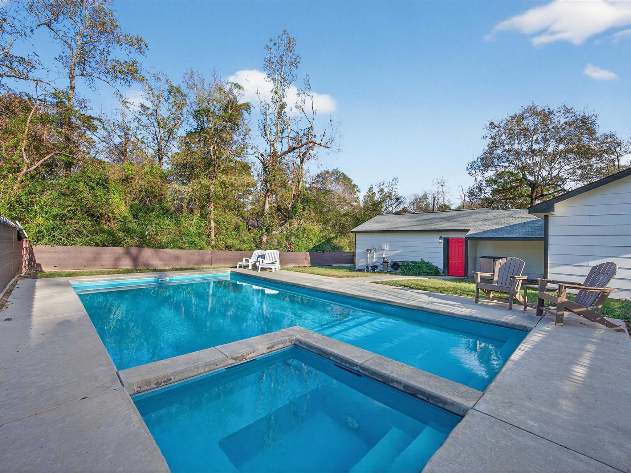 10277 Champion Forest Loop Conroe, TX 77303 - Photo 37 of 45 a view of a chairs and table in the patio