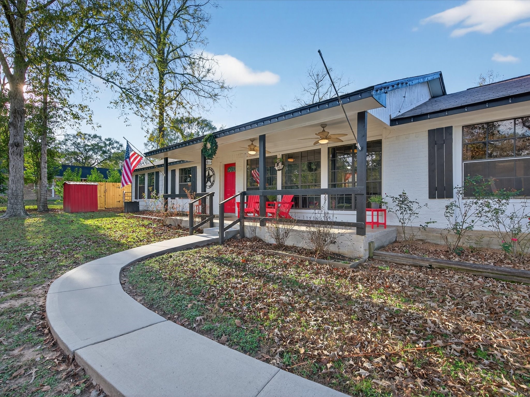 10277 Champion Forest Loop Conroe, TX 77303 - Photo 9 of 45 a view of house with a big yard and potted plants