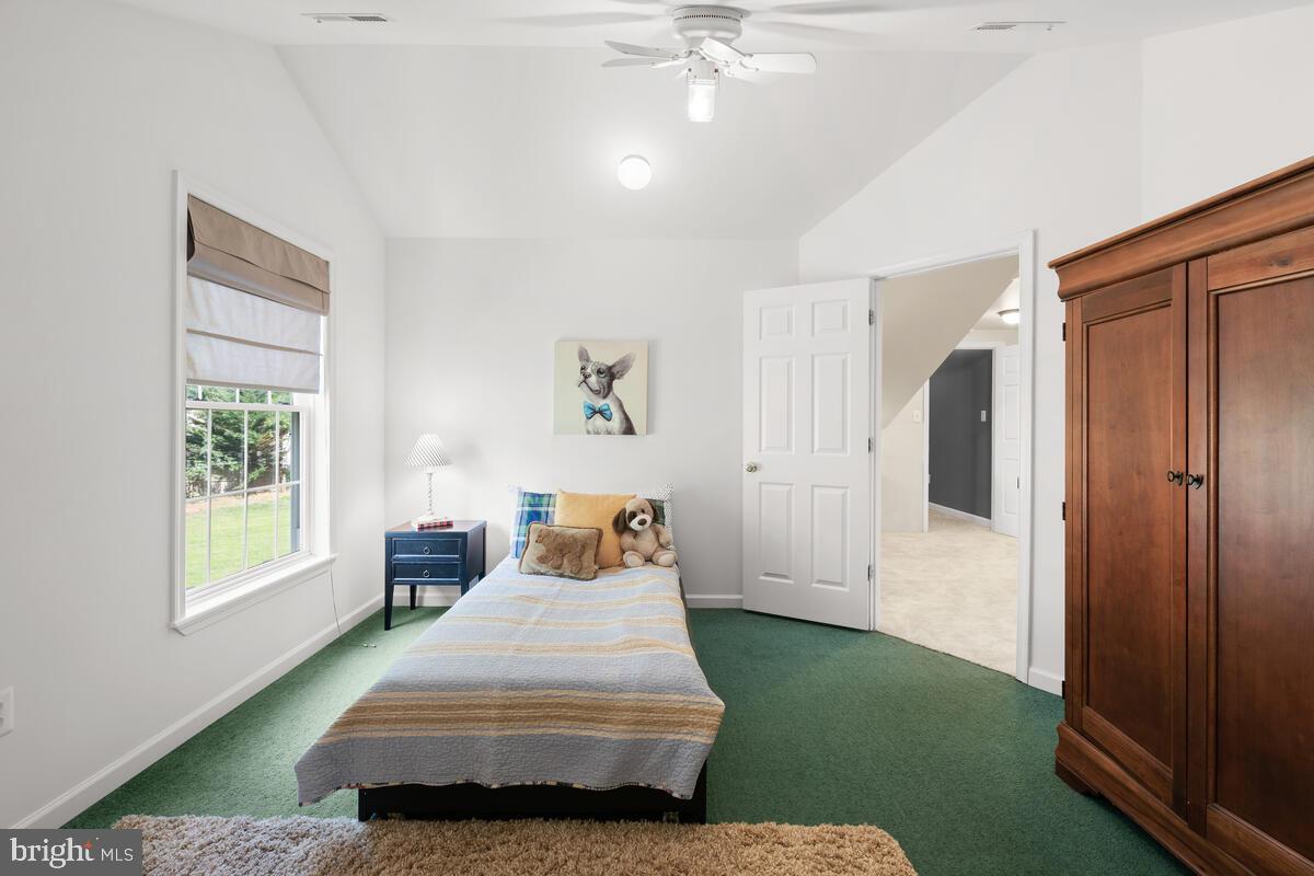2395 Sunset Farm Road Ellicott City, MD 21042 - Photo 40 of 73 a spacious bedroom with a bed and a window