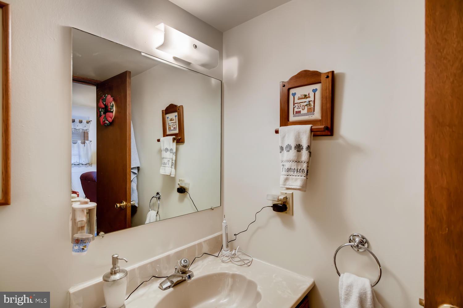 9413 Oak White Road Baltimore, MD 21236 - Photo 14 of 16 Lower Level Half Bathroom