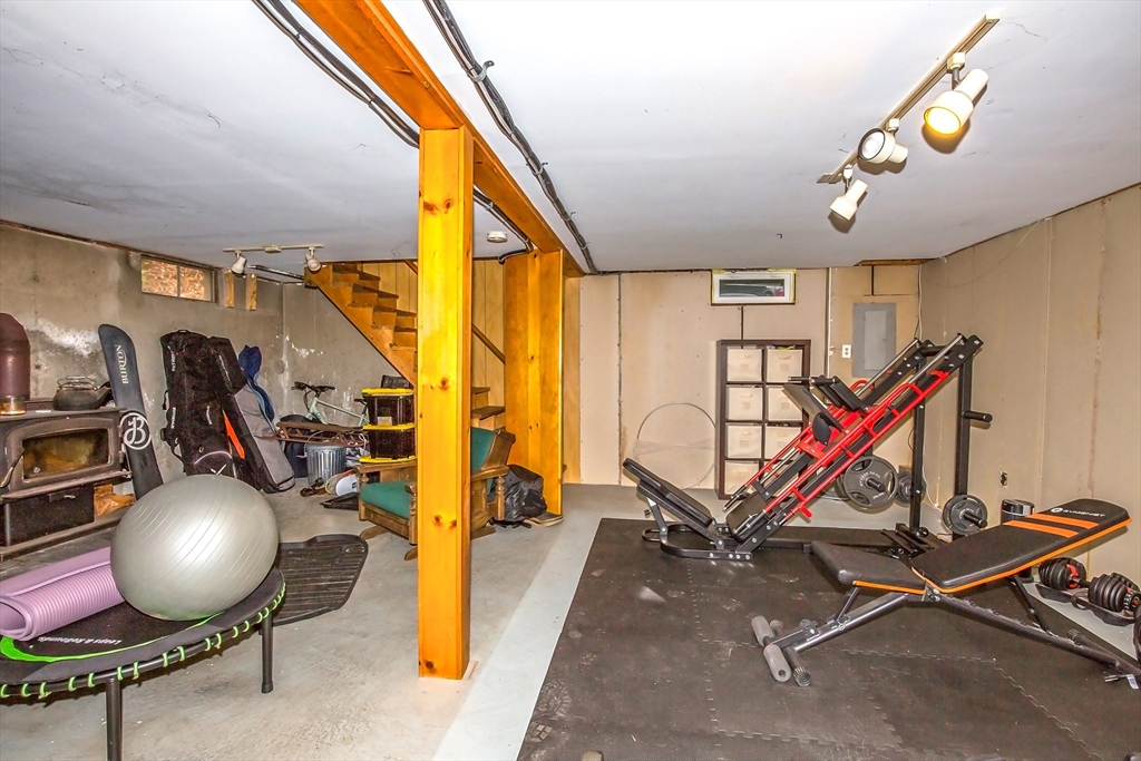 4498 High Street Palmer, MA 01069 - Photo 22 of 26 a room with gym equipment
