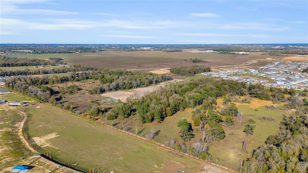 Tbd Southwest 80th Avenue Ocala, FL 34481 - Photo 12 of 13 a view of a city and an ocean view