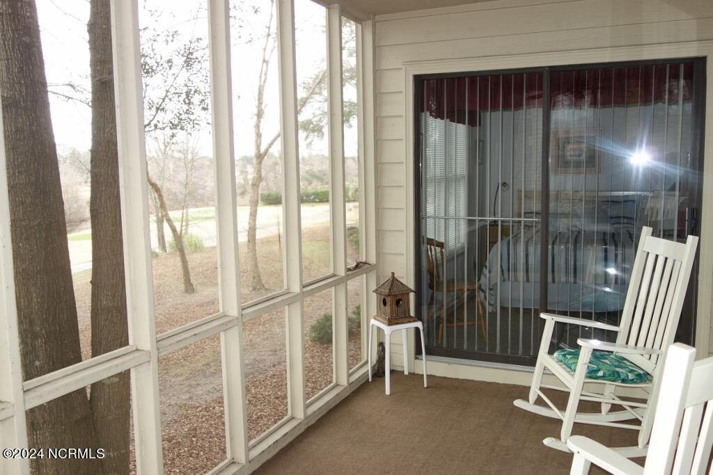 217 Clubhouse Road, Unit 3 Sunset Beach, NC 28468 - Photo 34 of 47 Screened Porch
