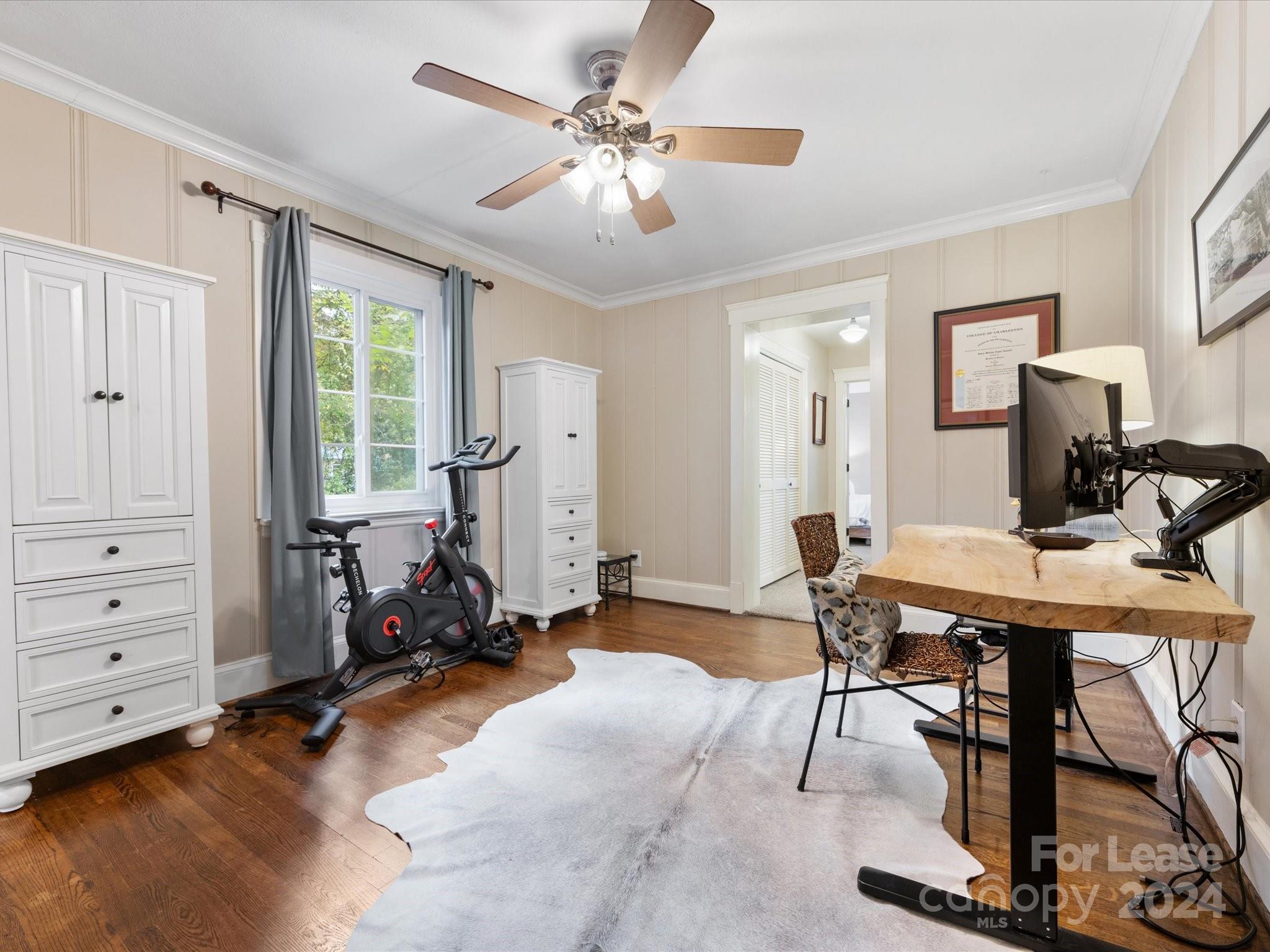 4411 Castleton Road Charlotte, NC 28211 - Photo 23 of 45 a view of a workspace with furniture and a window